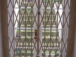 Розсувні решітки для вікот та дверей